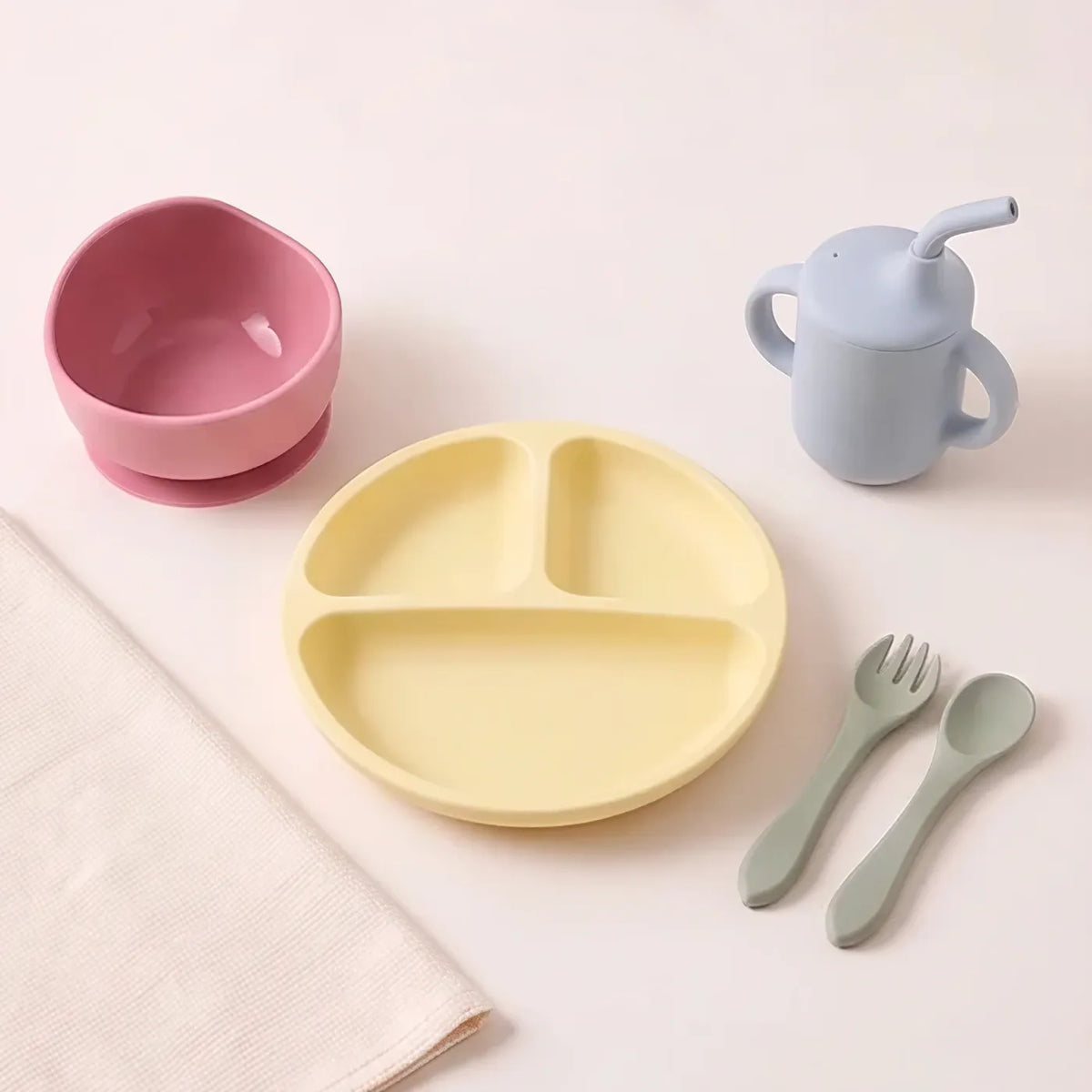 Silicone baby mealtime set with suction plate, bowl, sippy cup and cutlery