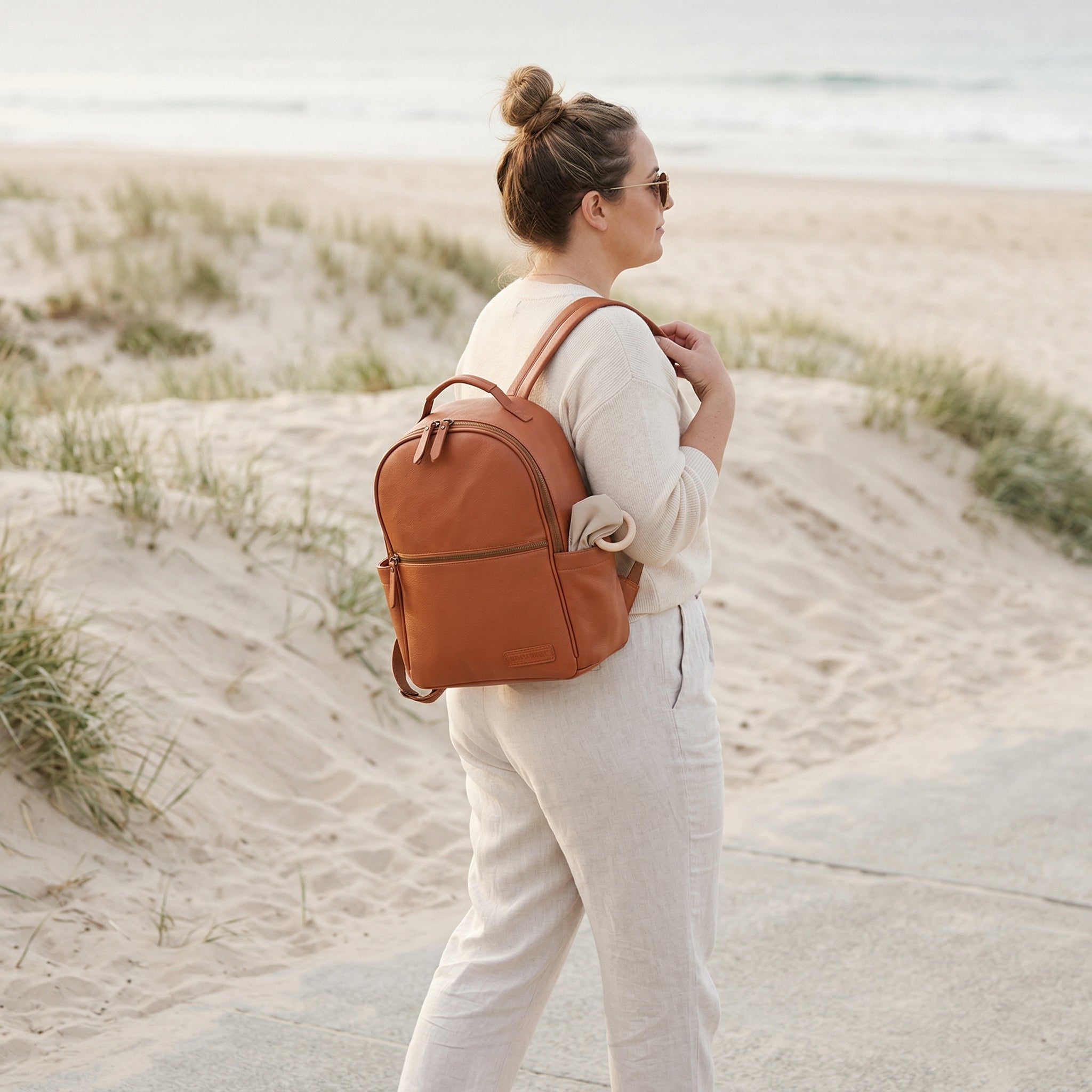 Alder backpack in warm tan tone with interchangeable strap system