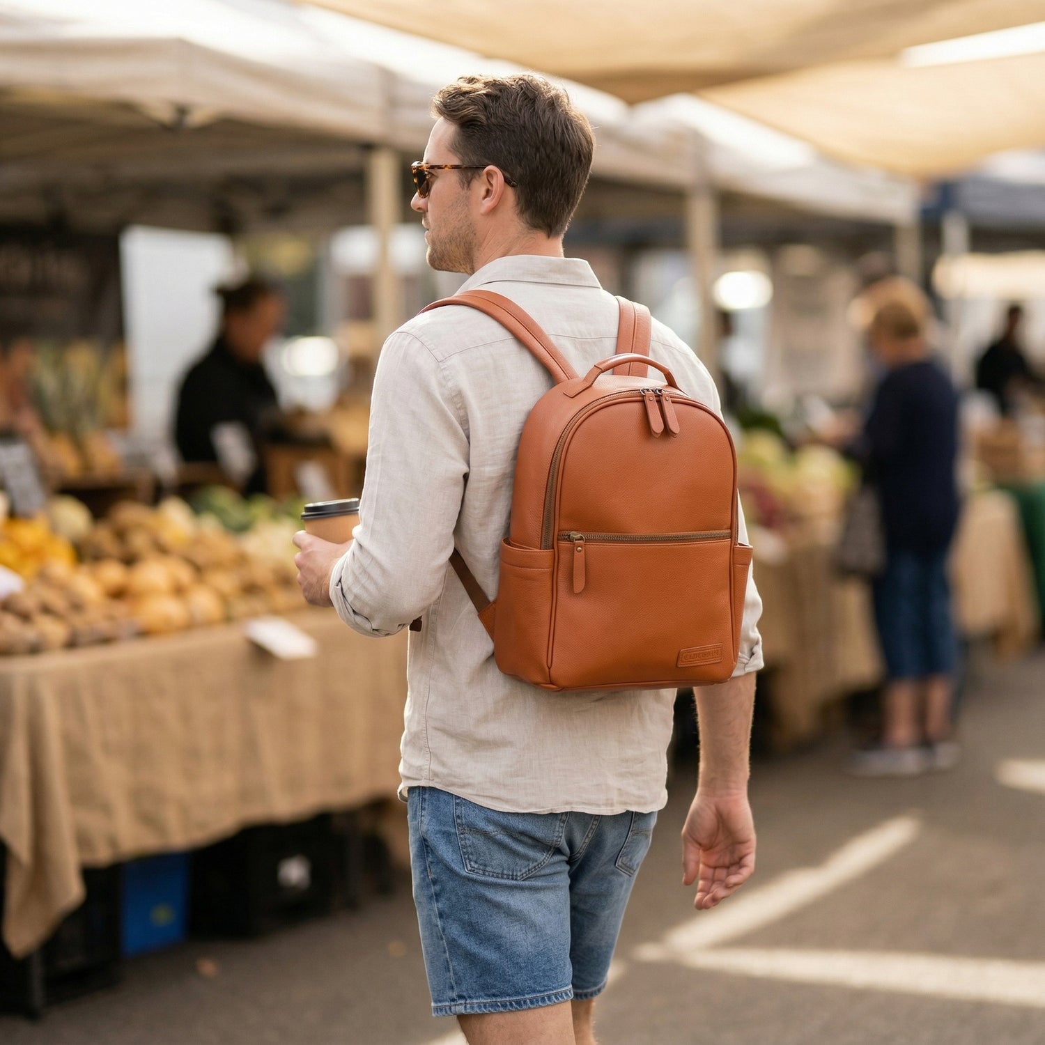 Alder backpack in warm tan tone with interchangeable strap system