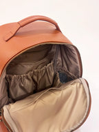 Vegan leather Alder backpack in warm tan tone with interchangeable strap system