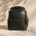 Flint backpack with interchangeable strap system in dark neutral tone