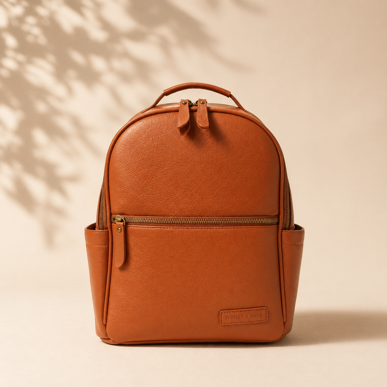 Alder backpack in warm tan tone with interchangeable strap system