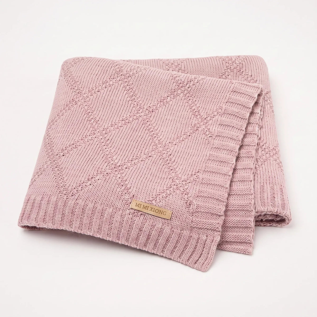 Lightweight cotton diamond knit baby blanket in Dolly
