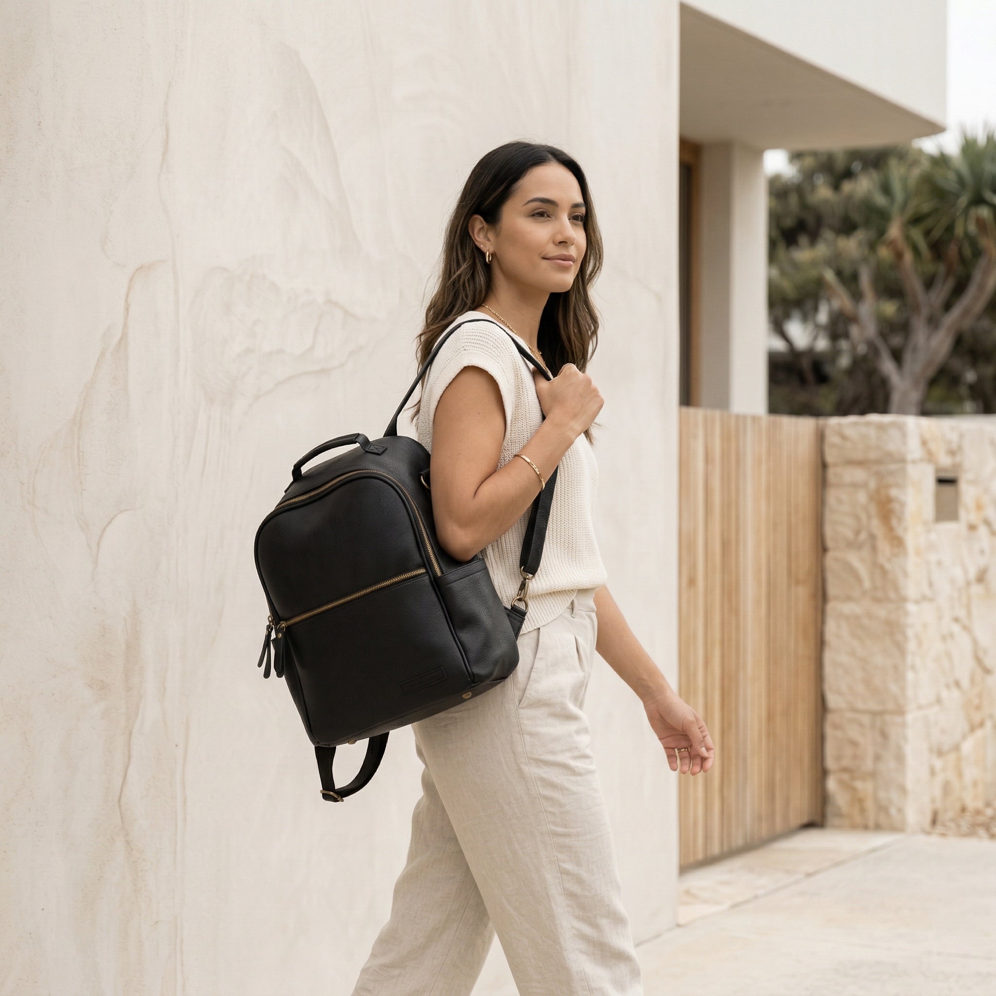 Flint backpack with interchangeable strap system in dark neutral tone