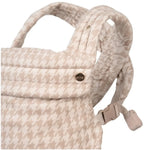 Birch ergonomic baby carrier on white background, close-up of front fold-down panel and back straps - Honey & Sage