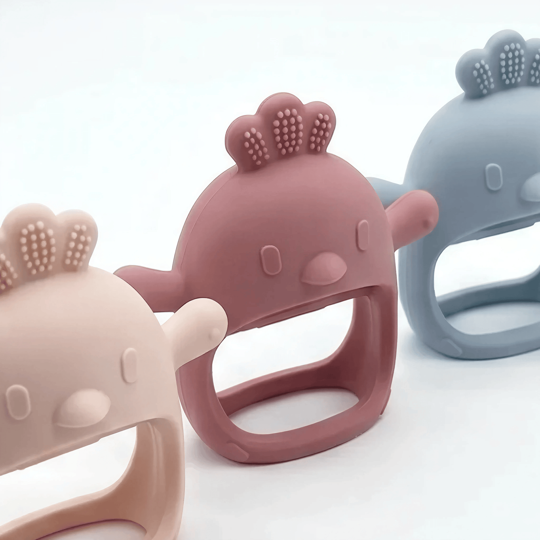 Nest silicone baby teethers Bronte (blush pink), Byron (deep pink) & Kiama (blue)