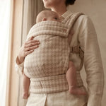 Birch ergonomic baby carrier, worn in front carry position with baby facing inward - Honey & Sage