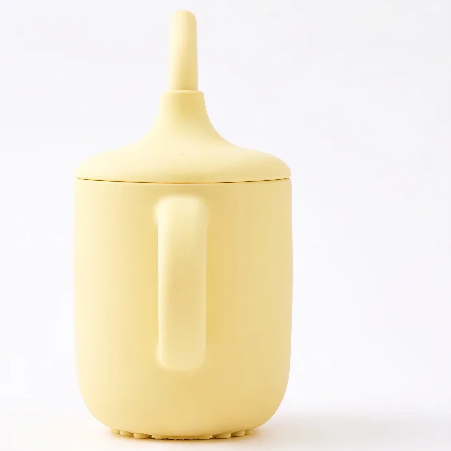 Silicone sippy cup with straw in Dawn (bright yellow), close-up of straw and lid