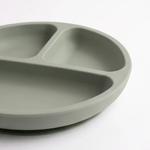 Silicone suction plate in Sage (green), angled side view