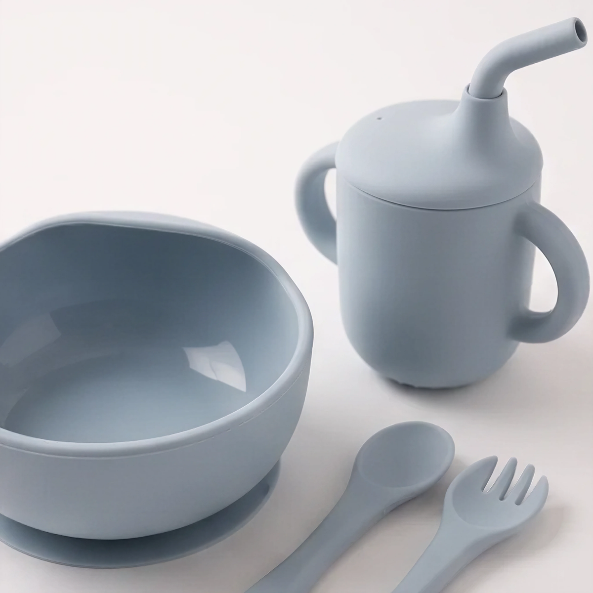 5 piece baby silicone feeing set in Harbour (blue) with suction plate, sippy cup, suction bowl, fork and spoon