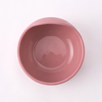 Silicone suction bowl in Rosewood (blush pink), close-up front view