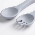 Close-up of silicone baby spoon and fork, easy-grip design
