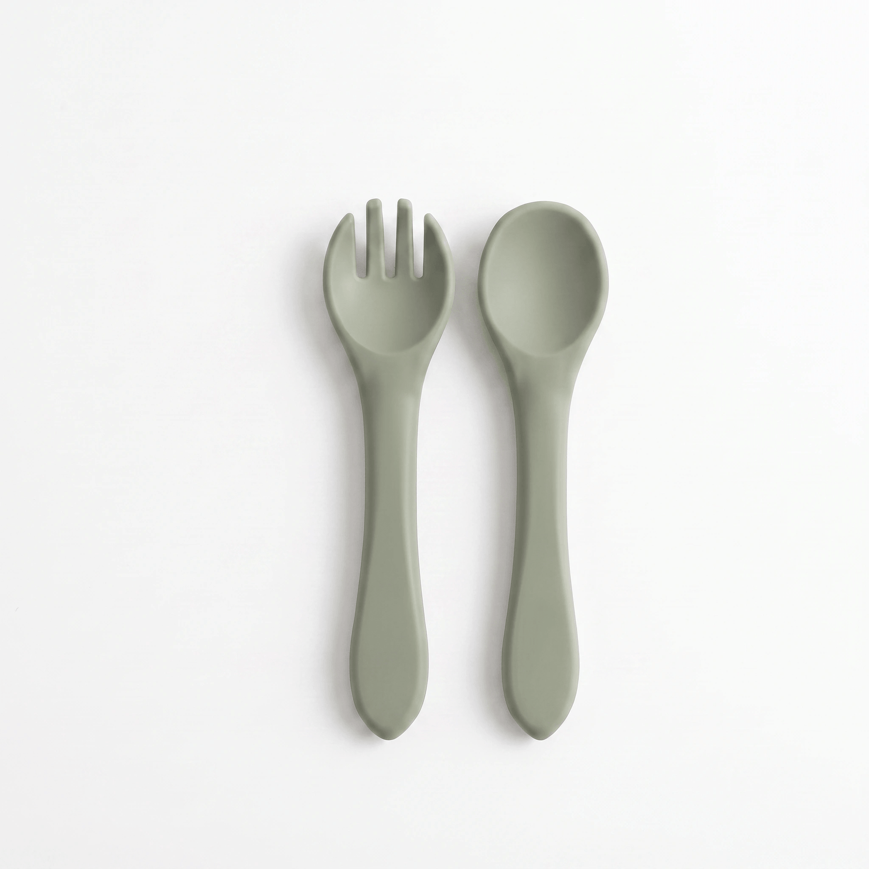 Silicone baby utensils set in Sage (green) – spoon and fork