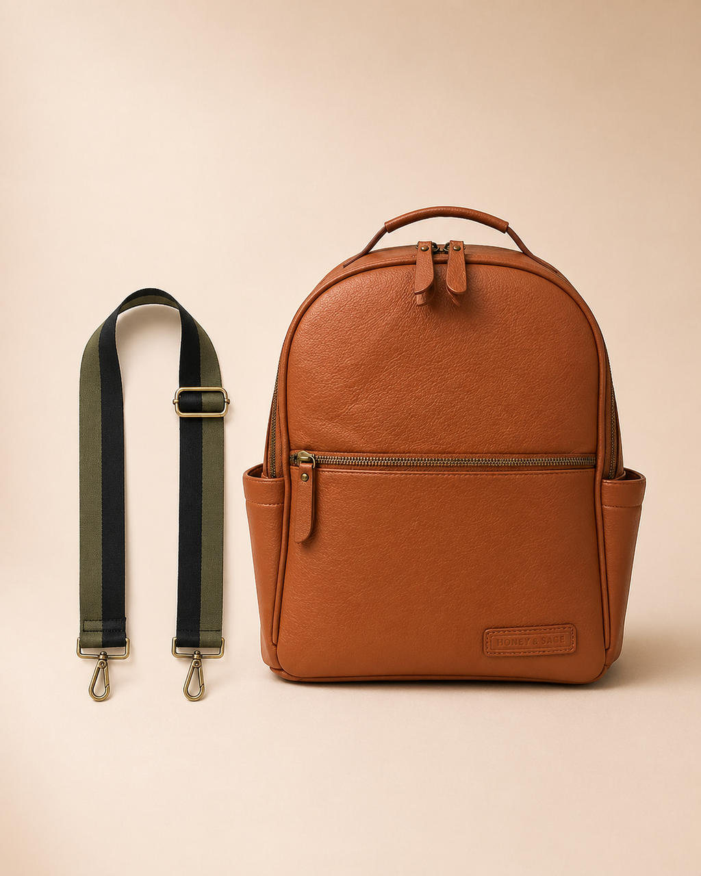 Dark neutral dusk toned interchangeable bag strap with gold hardware flat lay with Alder Backpack