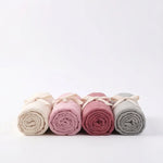Rolled bamboo baby swaddles in Esperance, Airlie, Broome and Stirling, lined up