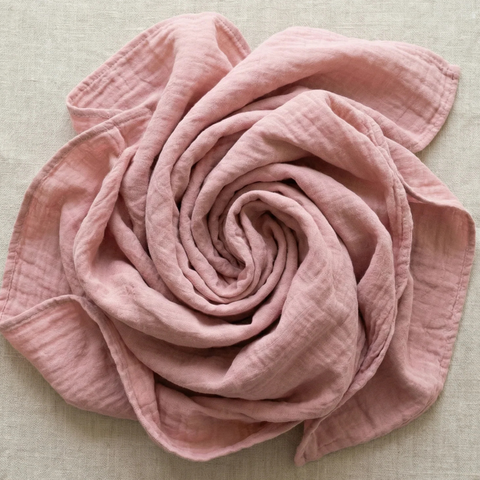 Soft pink baby swaddle blanket textured breathable fabric