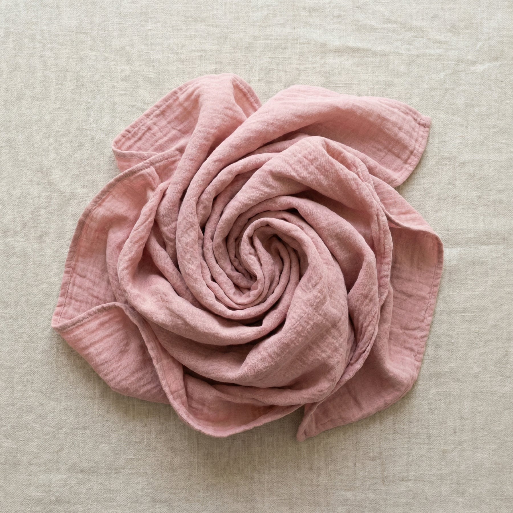 Soft pink baby swaddle blanket textured breathable fabric