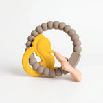 Reef silicone and beechwood baby teether in Golden Sand