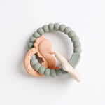 Reef silicone and beechwood baby teether in Lagoon Reef