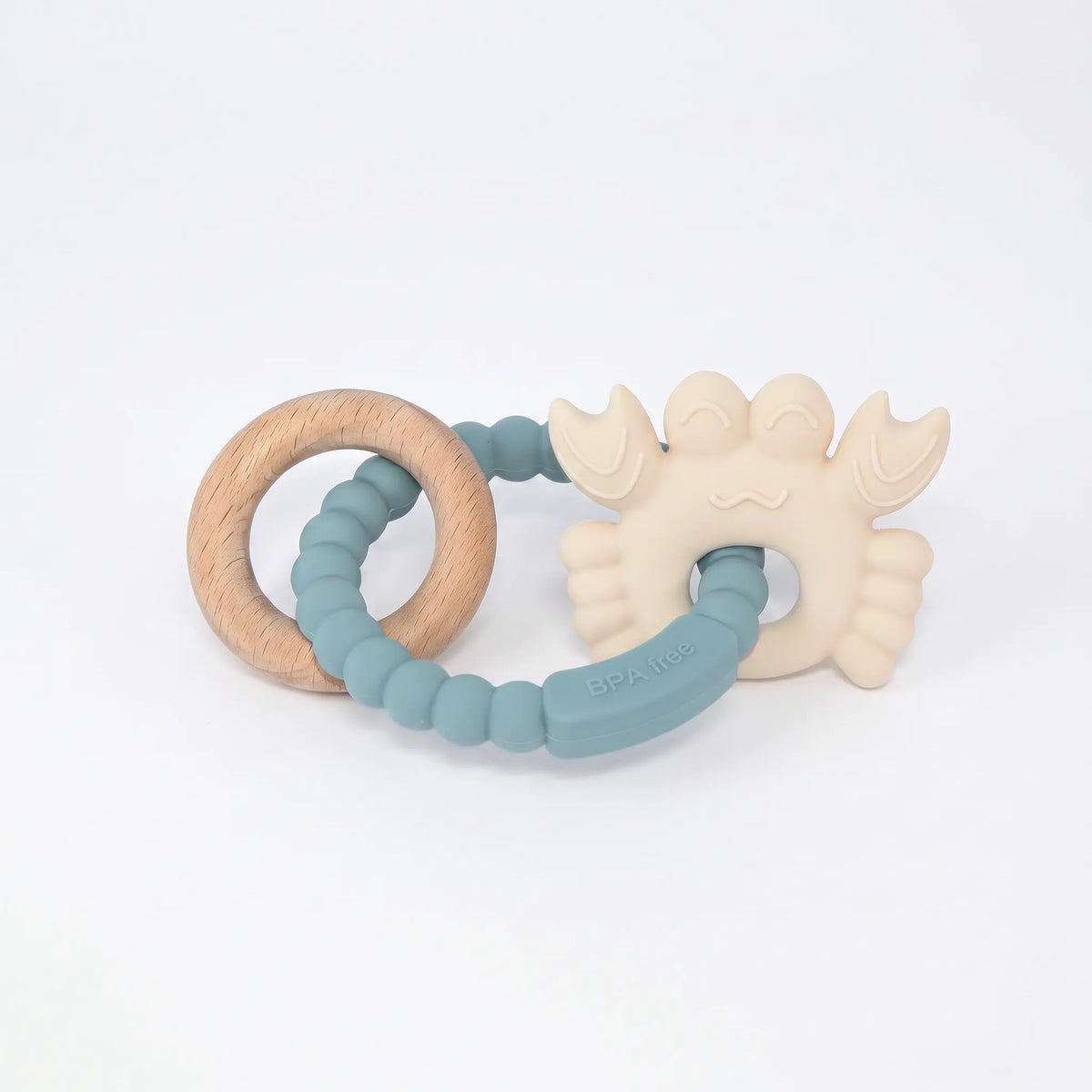 Reef silicone and beechwood baby teether in Tidal Cove