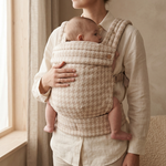 Birch baby carrier worn in front carry position neutral beige fabric