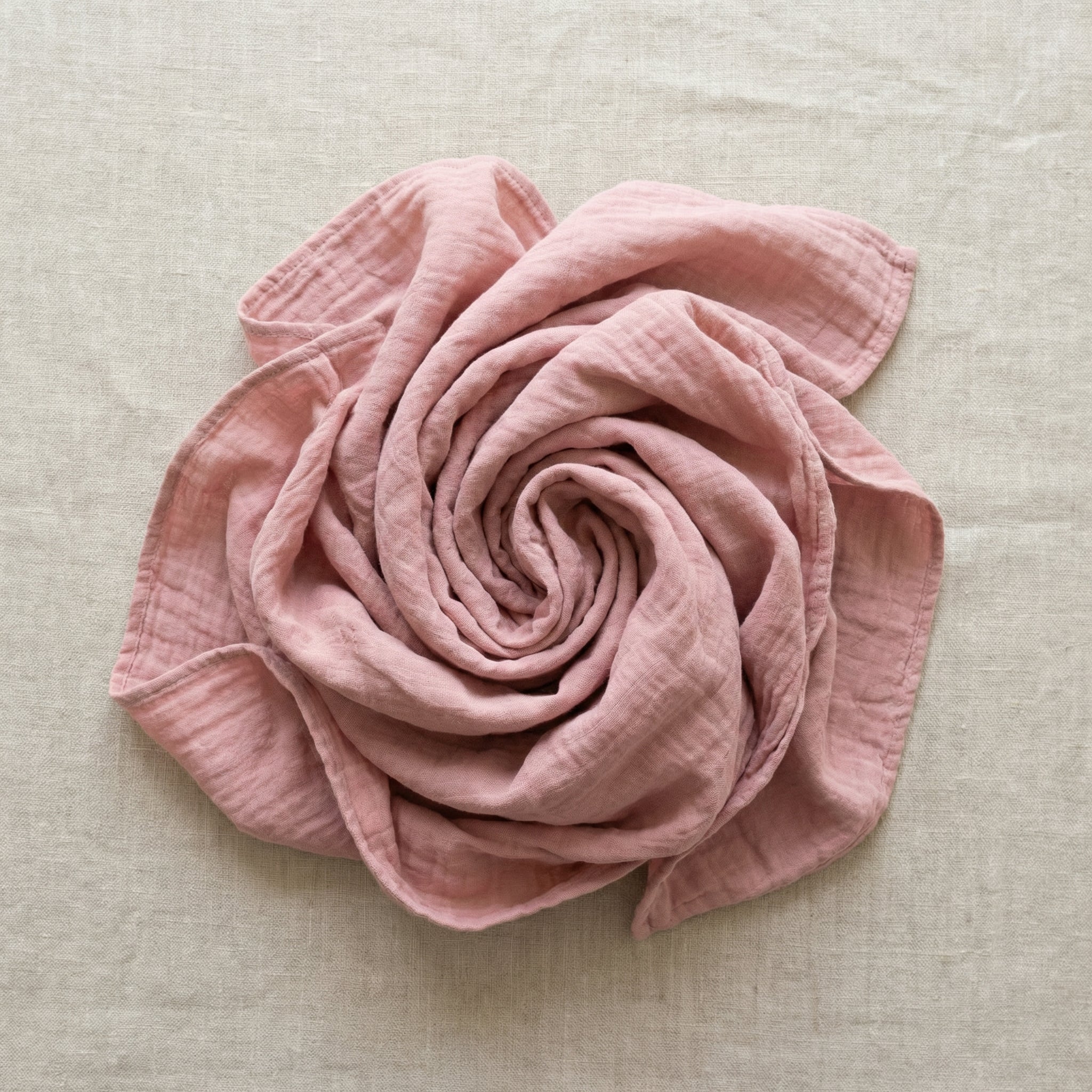 Soft pink baby swaddle blanket textured breathable fabric
