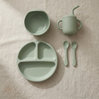 Sage green silicone baby dining set with utensils, cup, bowl and plate