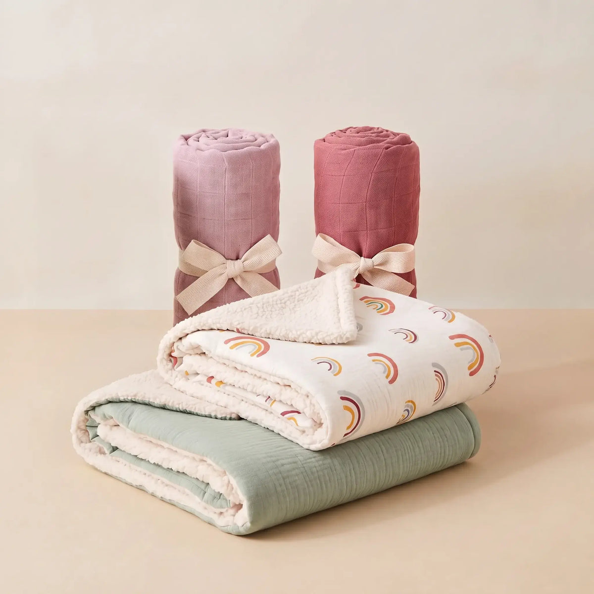Bamboo and Sherpa baby bundle with rolled bamboo swaddles and Hope and Haven sherpa blankets