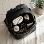 Flint backpack with interchangeable strap system in dark neutral tone
