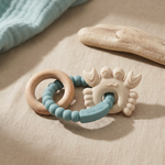 Blue and neutral silicone baby teether with beechwood ring tidal cove tones