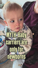 10month old baby in front facing carry in baby carrier storm pattern